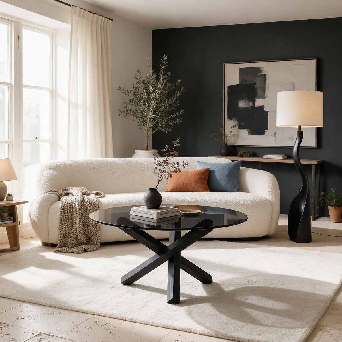 Table basse ronde Croisée teinte Noir, mise en situation dans un salon